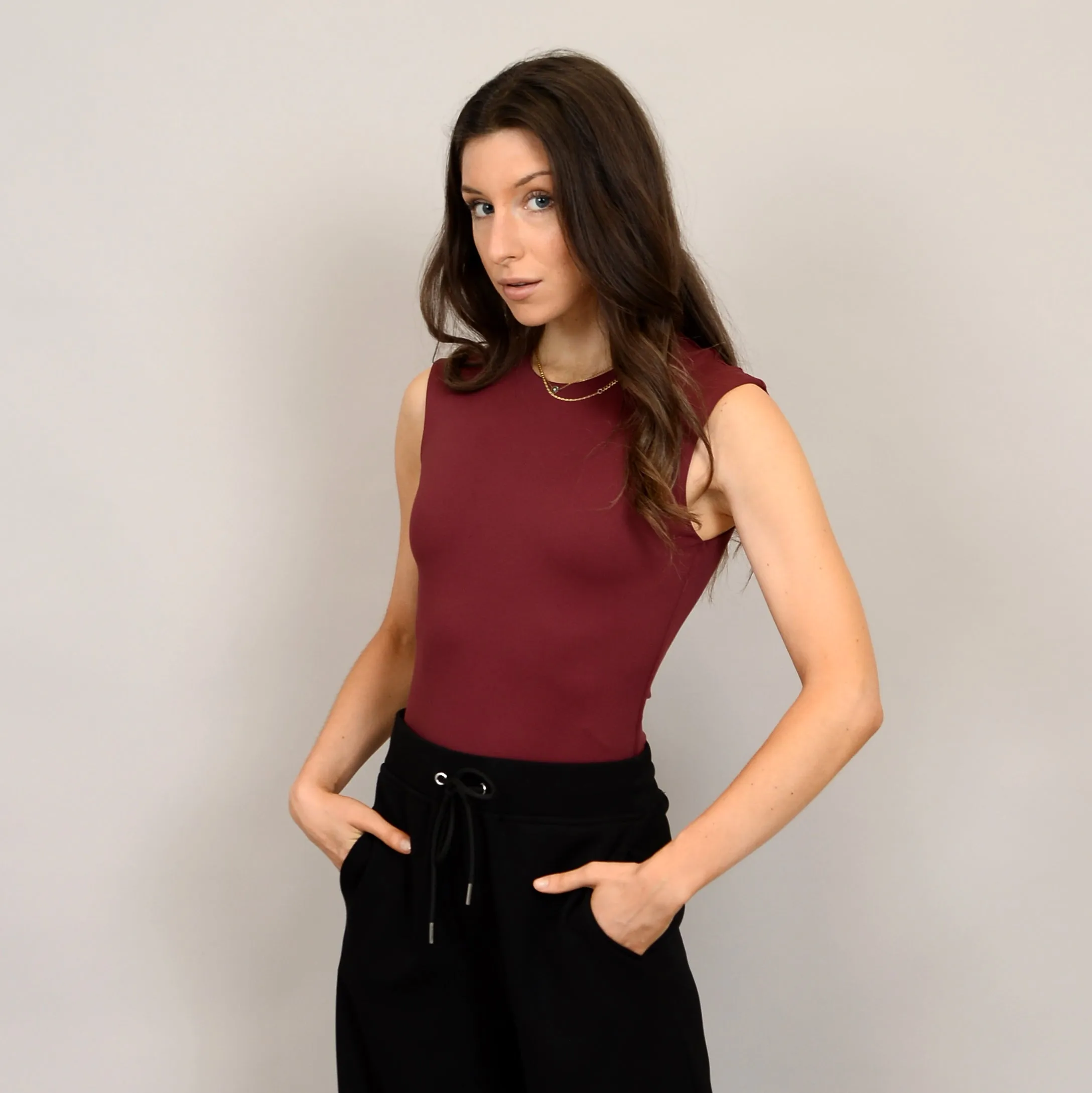 SECOND SKIN BY RD STYLE WOMEN'S ROXI SLEEVELESS CREWNECK BODYSUIT- OXBLOOD